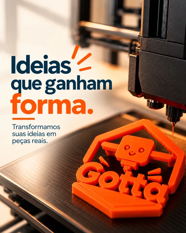 Peça laranja com o logo da Gotta sendo impressa na impressora 3D